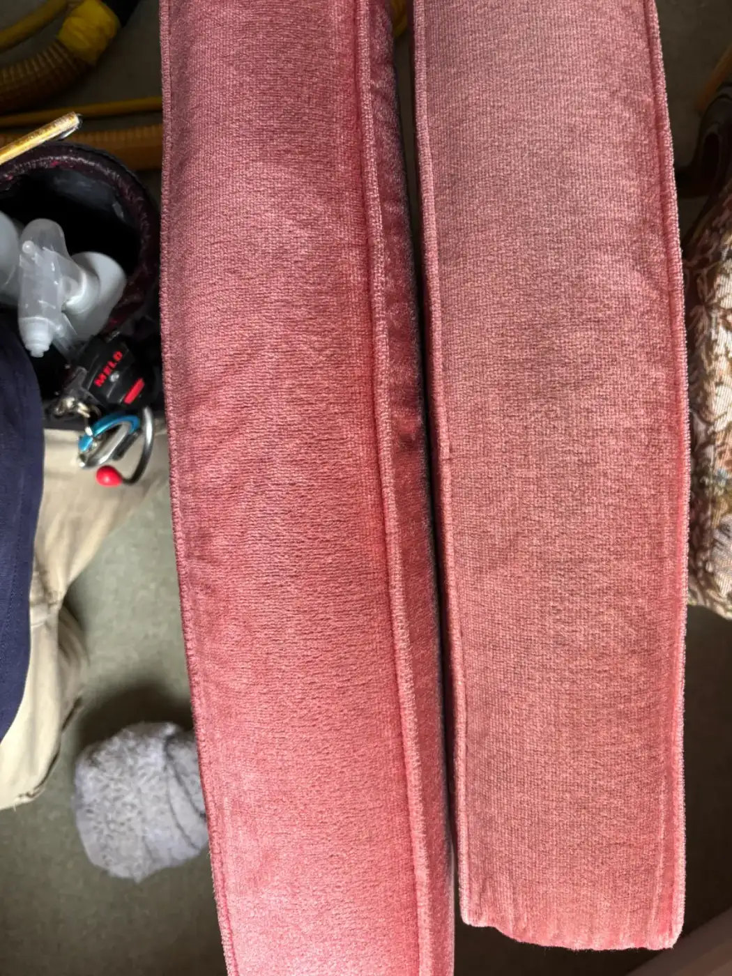 Velvet cushions cleaned and uncleaned side by side